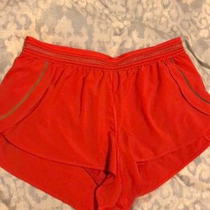 Orange lululemon shorts